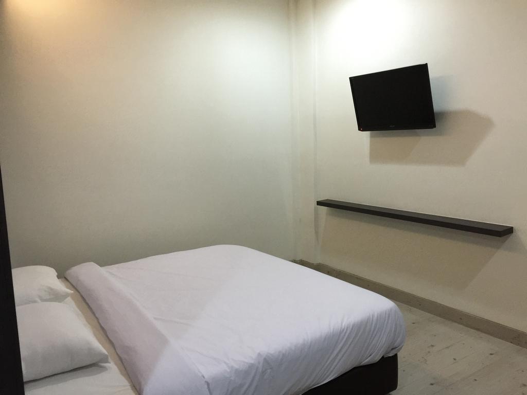 Redlink Hotel Batam Værelse billede